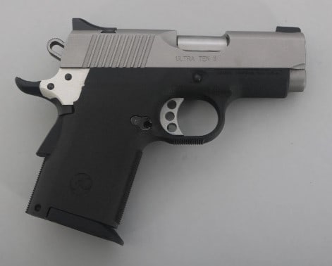 KIMBER MODEL ULTRA TEN II .45 ACP CALIBER PISTOL: KIMBER MODEL ULTRA TEN II .45 ACP CALIBER PISTOL. Kimber Model Ultra Ten II .45 ACP caliber semi automatic pistol. Stainless steel finish. Polymer frame. Fixed sights. Manual. Gun lock. One 