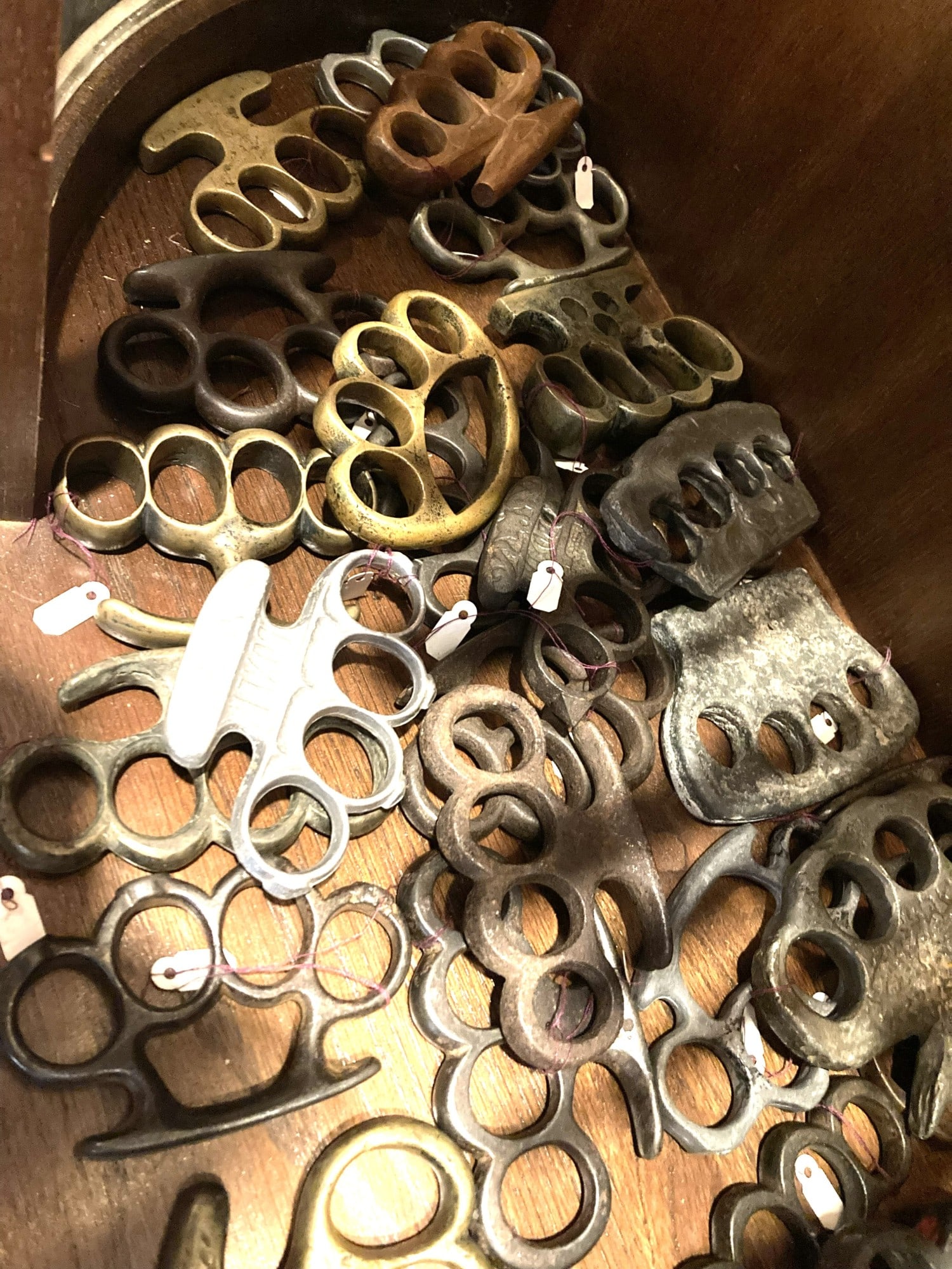 ANTIQUE FIGHTING BRASS NUCKLE COLLECTION: ANTIQUE FIGHTING BRASS NUCKLE COLLECTION BRASS, ALUMINUM, IRON. LEAD AND WOOD