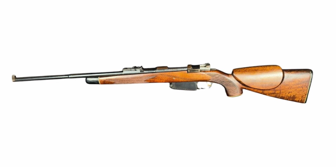 SPORTERIZED ARGENTINIAN LOEWE 1891 7.65mm RIFLE: Sporterized Argentinian Loewe 1891 7.65x53mm caliber bolt action Mauser rifle. Serial numbers match on barrel, receiver, and bolt. Blued finish. Adjustable rear sight. Checkered wood stock.