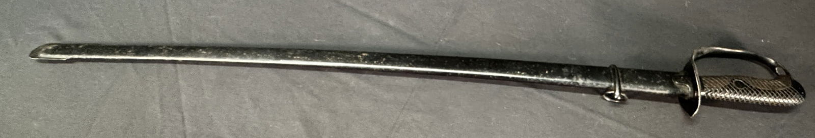 MILITARY SWORD AND SCABBARD: MILITARY SWORD AND SCABBARD HAS SAFTELY CATCH ON SCABBARD in. by Width: 39