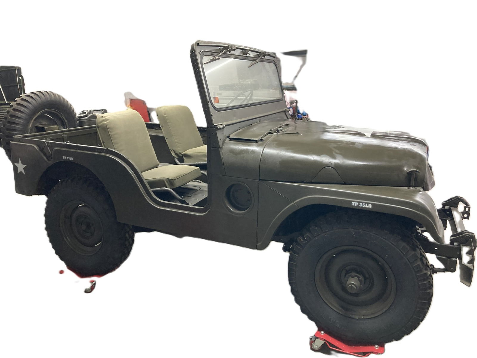 1953 WILLY'S MILITARY JEEP M38A1 WITH STAR: 1953 WILLY'S MILITARY JEEP M38A1 WITH STAR , FOLD DOWN FRON WINSHIELD TOTALLY RESTORED AND KEPT IN DRY STORAGE. wAS DRIVEN TO STORAGE