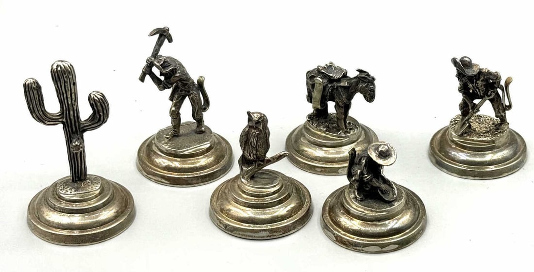 SIX STERLING WESTERN PLACE CARD HOLDERS: SIX STERLING SILVER PLACE CARD HOLDERS WITH WESTERN FLAIR DESIGN. 436 GRAMS. Height: 2 in. by Width: 1.5 in.