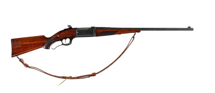 Savage 99 /300 Lever Action Rifle: Savage Model 99 in .300 Savage with a five round capacity and a 24" barrel. Made in Utica New York in 1926. Checkered wood stock and Schnabel style front forend. Case colored hand lever. Blued serrate