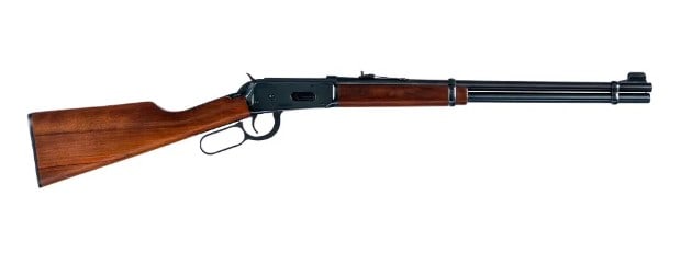 Winchester 94 30-30 Lever Action Rifle: Winchester 94 Carbine in .30-30 Winchester with a seven round capacity and a 20" barrel. Made in New Haven Connecticut in 1971. Smooth wood stock and front foregrip. Blued hand lever, trigger, receive