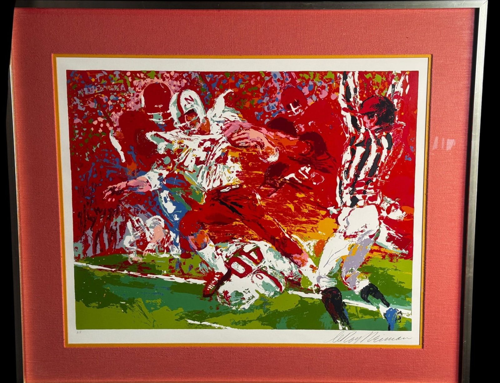 NEBRASKA FOOTBALL LITHOGRAPH SIGNED BY L NEIMAN: NEBRASKA FOOTBALL LITHOGRAPH SIGNED BY LEROY NEIMAN. Height: 33 in. by Width: 40 in.