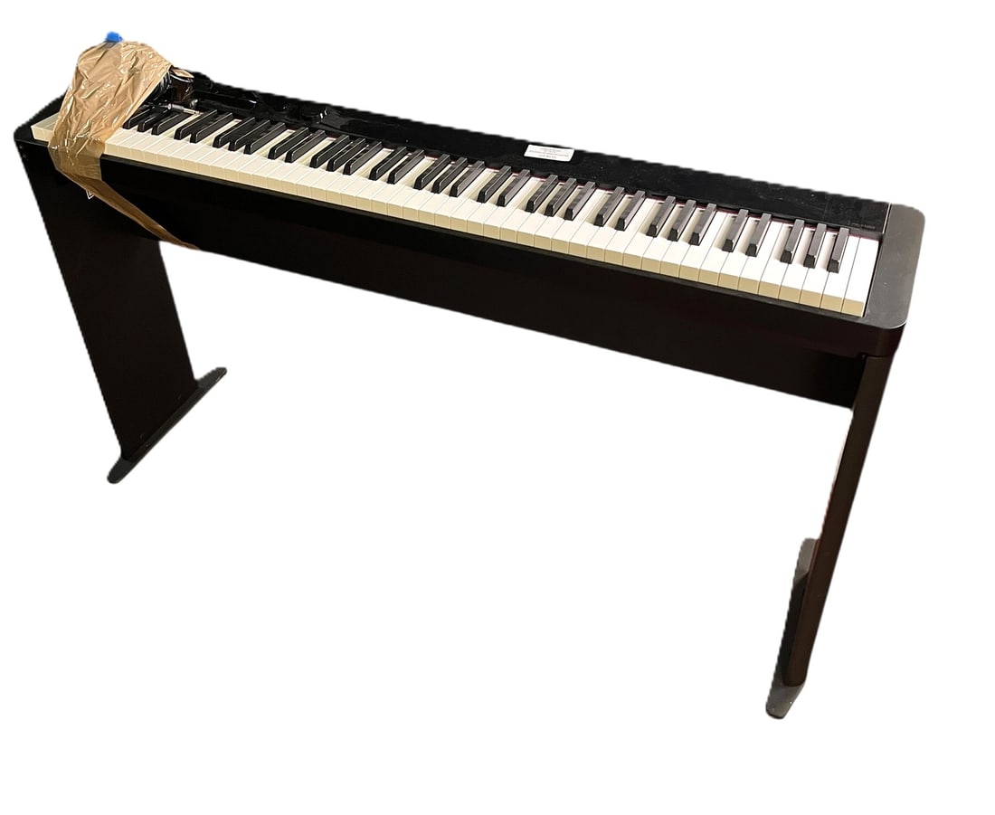 PRIVA ELECTRIC KEYBOARD: PRIVA ELECTRIC KEYBOARD. Height: 29 in. by Width: 52 in. by Depth: 9.5 in.