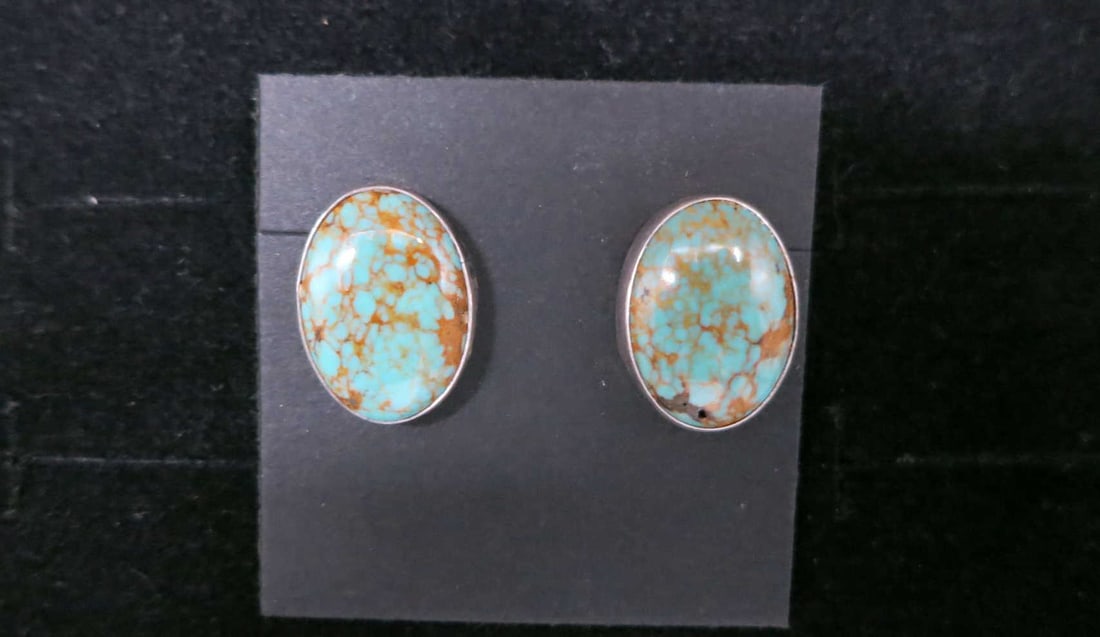 PAIR OF TURQUOISE & SILVER EARRINGS: PAIR OF TURQUOISE & SILVER EARRINGS. Height: 3/4 in. by Width: .5 in. by Depth: 3/8 in.