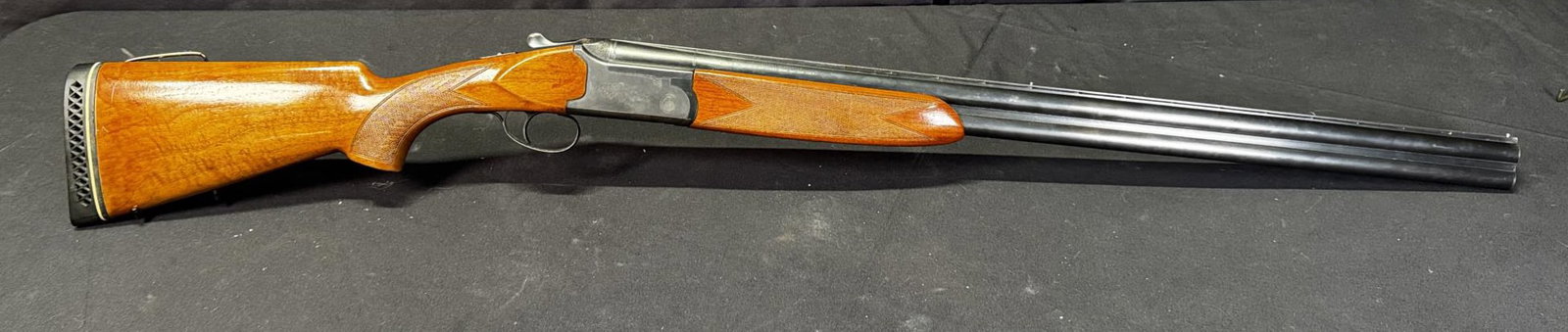 SAVAGE MODEL 440 12 GA 2 3/4 CHAMBER OVER UNDER: SAVAGE MODEL 440 12 GA 2 3/4 CHAMBER OVER UNDER SHOTGUN. SERIAL #50654.