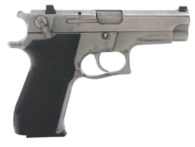 SMITH & WESSON MODEL 5906 9mm CAL SEMI AUTO PISTOL: Smith & Wesson Model 5906 9x19mm caliber semi automatic pistol. Matte stainless steel finish. Fixed sights. Checkered composite grips. One magazine. Caliber / Gauge 9x19mm Barrel Length: 4" Serial Num
