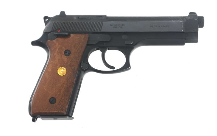 TAURUS MODEL PT92AF 9mm CALIBER SEMI AUTO PISTOL: Taurus Model PT-92AF 9x19mm caliber semi automatic pistol. Fixed sights. Wood grips with Taurus medallion. Caliber / Gauge 9x19mm Barrel Length: 4.75" Serial Number: THI41793 Classification: FFL 15409