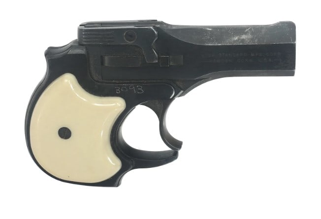 HI STANDARD MODEL DM-101 .22 MAG CALIBER DERRINGER: Hi Standard Model DM-101 .22 Magnum caliber derringer pistol. Blued finish. Composite grips. Caliber / Gauge 22 Magnum Barrel Length: 3.50" Serial Number: 2270674 Classification: C&R / FFL 154155/8585