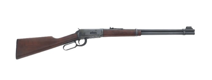 WINCHESTER MODEL 94 .30-30 CALIBER RIFLE: 1972 Winchester Model 94 .30-30 caliber lever action rifle. Blued finish. Hooded front sight. Adjustable rear sight. Wood stock. Checkered butt plate. Caliber / Gauge 30-30 Barrel Length: 20" Serial N