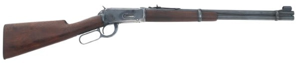 1900 WINCHESTER MODEL 1894 30-30 CALIBER RIFLE: 1900 Winchester Model 1894 .30-30 caliber rifle. 20" round barrel. Hooded ramp front sight. Adjustable rear sight. Saddle ring. Wood stock. Metal butt plate. Saddle ring plug screw. Caliber / Gauge 30