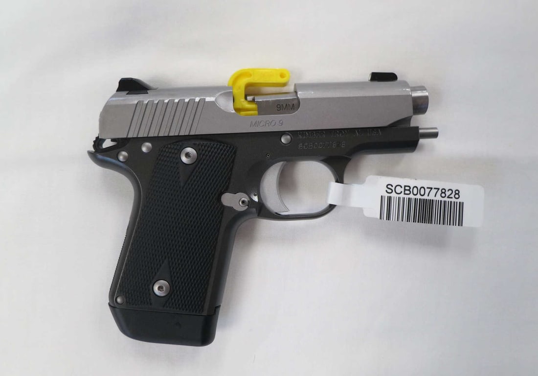 Kimber Micro 9 Cinder 9mm 7rd Pistol: Kimber Micro 9 Cinder 9mm 3.15" Aluminum KimPro II Gray Frame; Stainless Steel KimPro II Slide; White Dot Sights Black Rubber Grip. New in Case. Serial #sscb0077828. (L919)