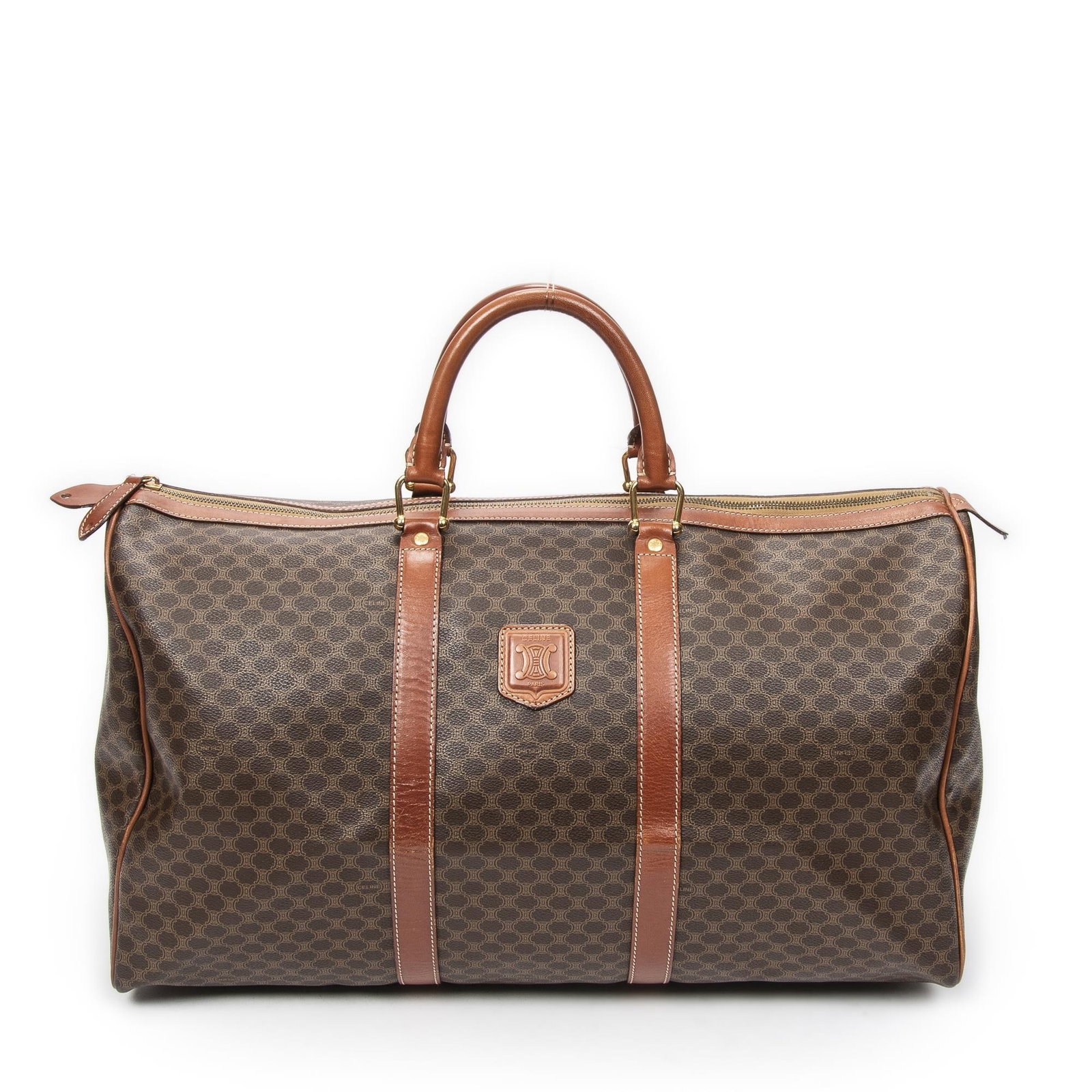 Celine Vintage Medium Travel Boston Travel B: Celine Vintage Medium Travel Boston Travel Bag. Made from Macadam Coated Canvas with Brown Leather straps/handles and Gold hardware. Dimensions: 51*28*24cm. Accessories include: None. Condition 