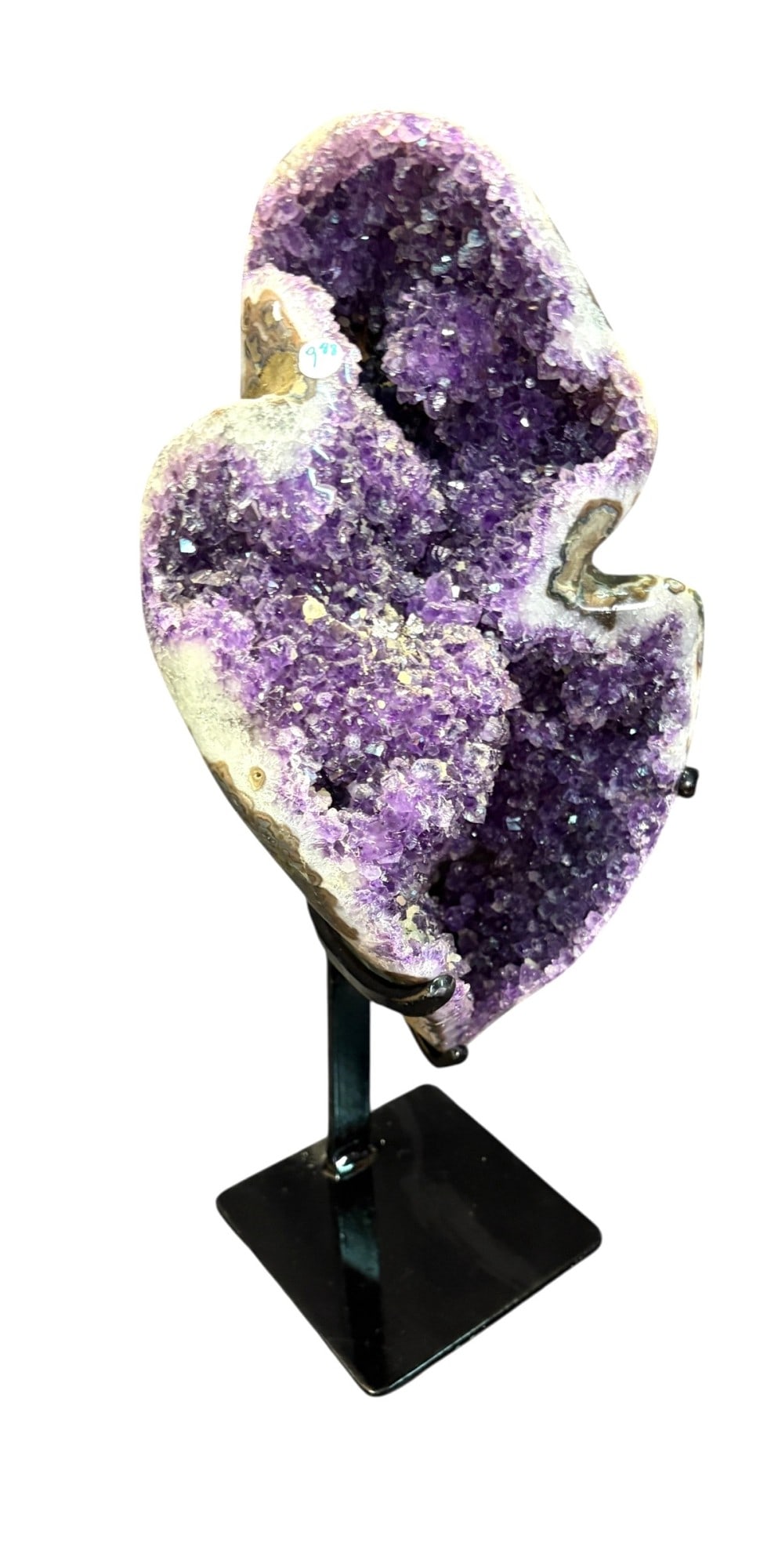 AMETHYST ON IRON STAND: ANUNUSUAL AMETHYST FORMATION ON IRON STAND 9.88kg Height: 16.5 in. by Width: 8.5 in. by Depth: 7 in.