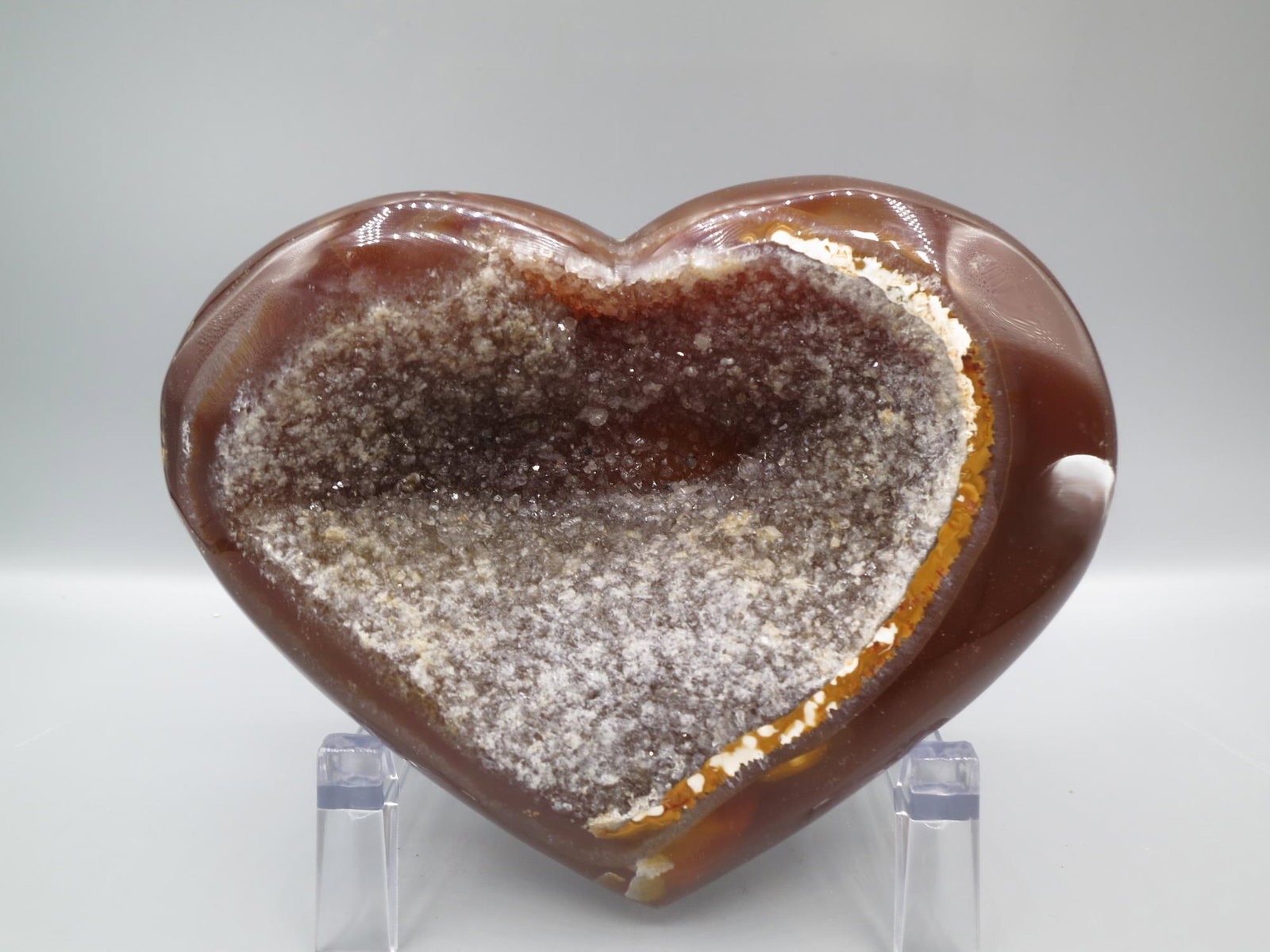 POLISHED AGATE/JASPER GEODE HEART: POLISHED AGATE/JASPER GEODE HEART. 698.8 GRAMS. Height: 4 in. by Width: 5 in. by Depth: 1.5 in.