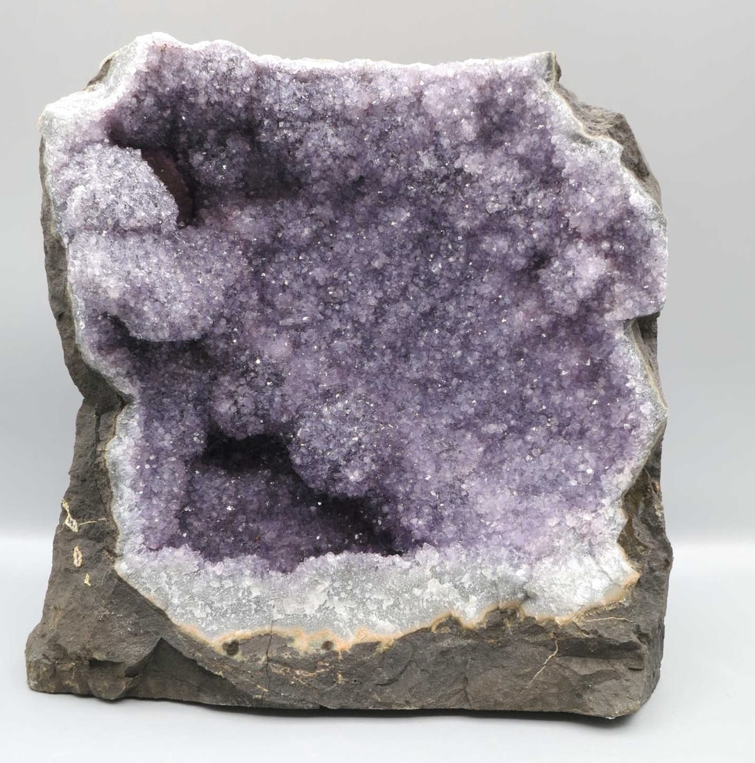 NATURAL AMETHYST GEODE: NATURAL AMETHYST GEODE. 3756.2 GRAMS. Height: 7 in. by Width: 7 in. by Depth: 4.5 in.
