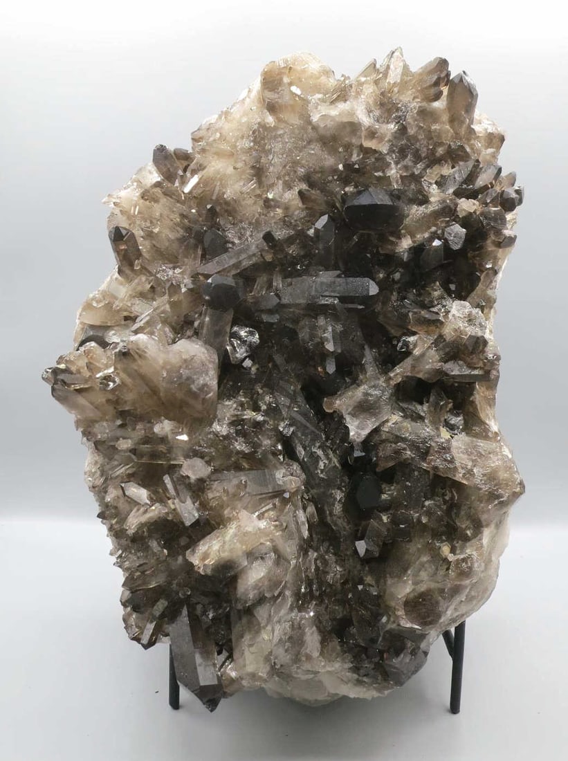 SMOKEY QUARTZ CRYSTAL CLUSTER: SMOKEY QUARTZ CRYSTAL CLUSTER. 8.1KG. Height: 10 in. by Width: 7.5 in. by Depth: 6.5 in.