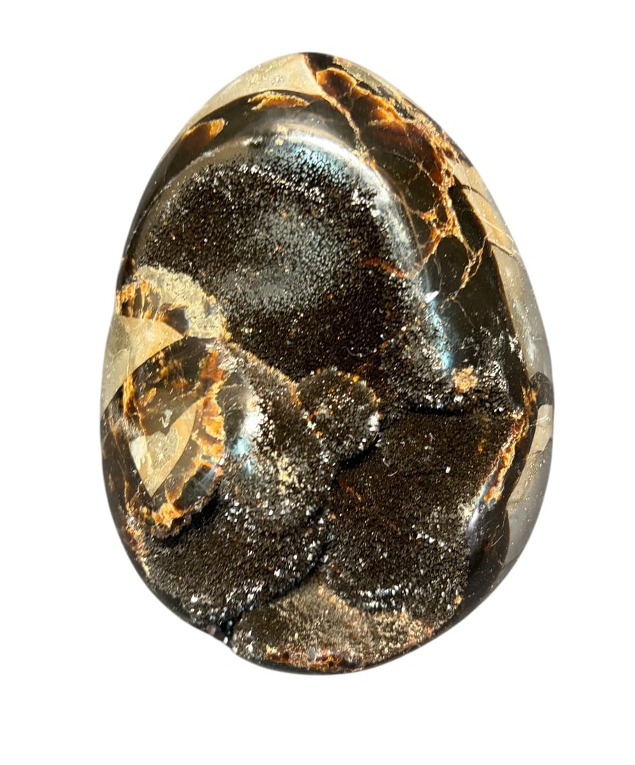 SEPTARIAN EGG SHAPED CRYSTAL POLISHED: SEPTARIAN EGG SHAPED CRYSTAL POLISHED 5.4LBS Height: 6.5 in. by Width: 5 in. by Depth: 5 IN.