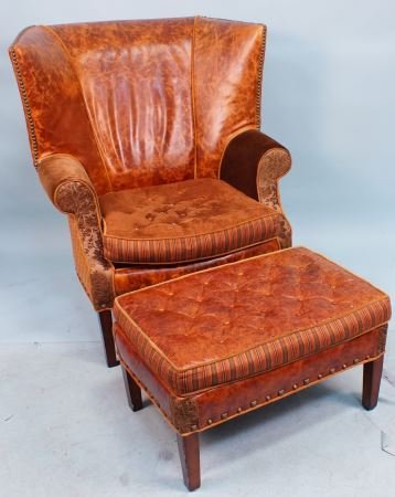 CUSTOM MADE JEFF ZIMMERMAN WING CHAIR & OTTOMAN: CUSTOM MADE JEFF ZIMMERMAN COLLETION WING CHAIR & OTTOMAN WITH BUTTONED TUFTED LEATHER. Height: 43 and 17 in. by Width: 35 and 28 in. by Depth: 36 and 20 in.