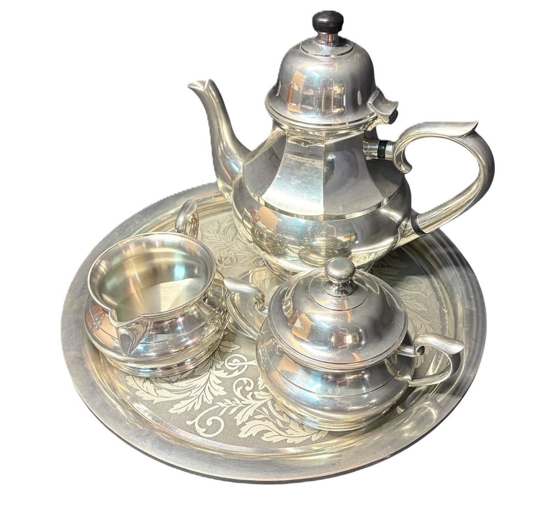 INTAGE PEWTER TEA SET: VINTAGE PEWTER TEA SET INCLUDES TRAY, TEA POT, CREAMER AND SUGAR BOWL.. Height: 8 in. by Width: 9 in. by Depth: 5 IN.