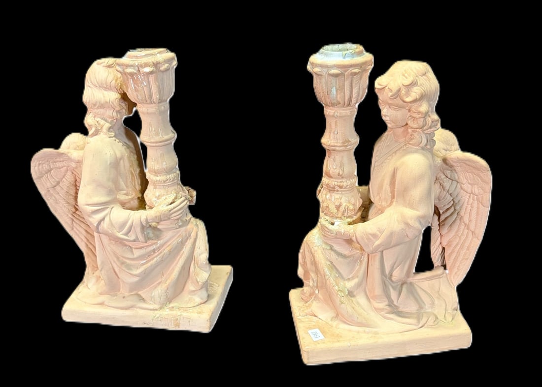 PAIR OF VINTAGE TERRACOTTA ANGLE CANDLESTICKS: PAIR OF VINTAGE TERRACOTTA ANGLE CANDLESTICKS. Height: 11 in. by Width: 6 in. by Depth: 3.5 in.