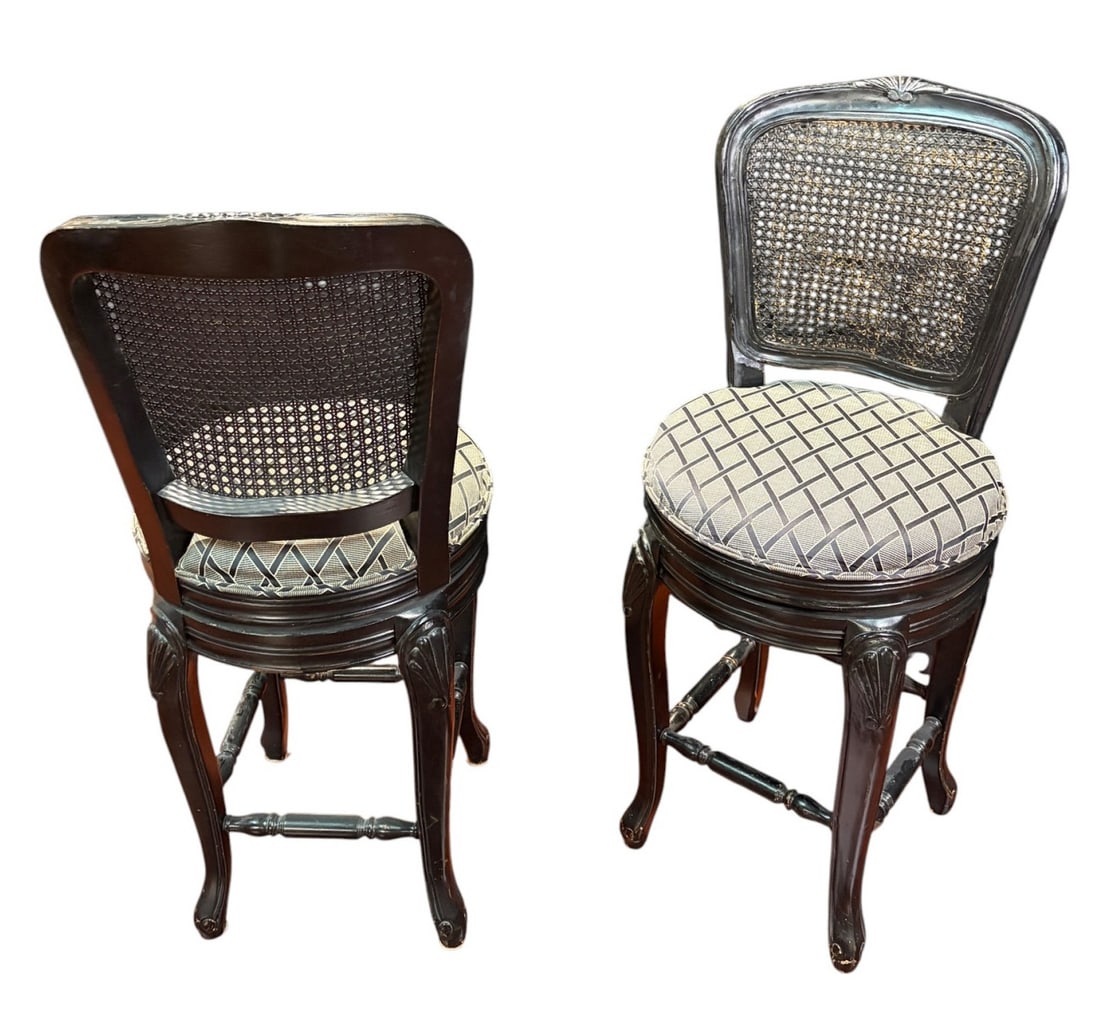 PAIR OF BLACK FRENCH STYLE CANE BARSTOOLS: PAIR OF BLACK FRENCH STYLE CANE BARSTOOLS WITH SWIVEL SEATS. Height: 41 in. by Width: 19 in. by Depth: 18 in.