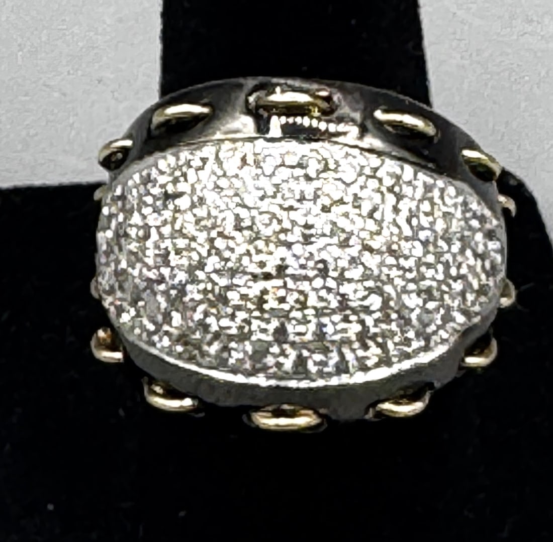 YELLOW & WHITE GOLD MICRO PAVE SET DIAMOND RING: 14 K YELLOW & WHITE GOLD MICRO PAVE SET DIAMOND RING. SIZE 7. TOTAL WEIGHT: 15 GRAMS.