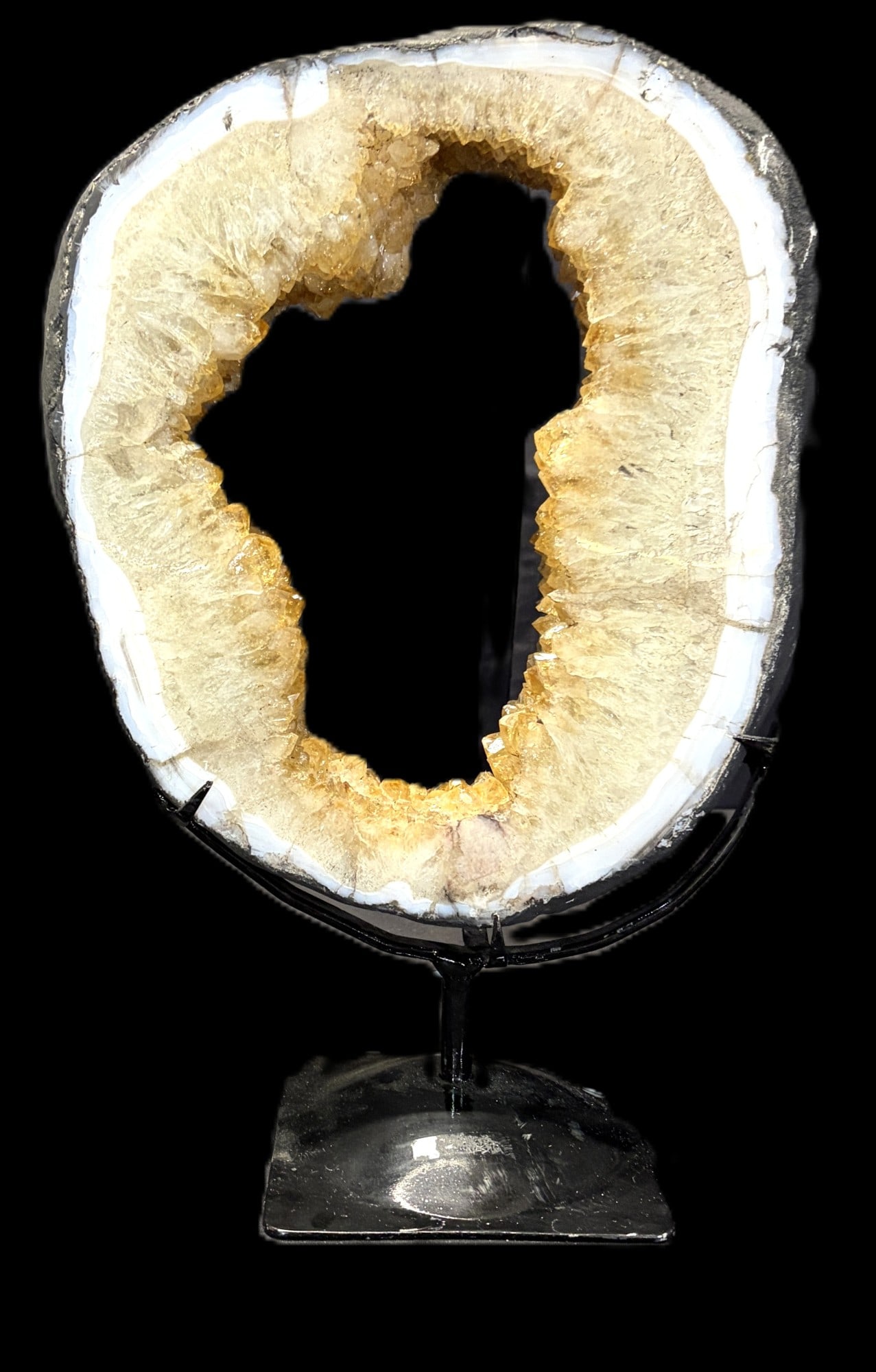 CITRINE CRYSTAL ON METAL STAND: CITRINE CRYSTAL ON METAL STAND. 12.2lbs. Height: 13 in. by Width: 11 in. by Depth: 2 in.