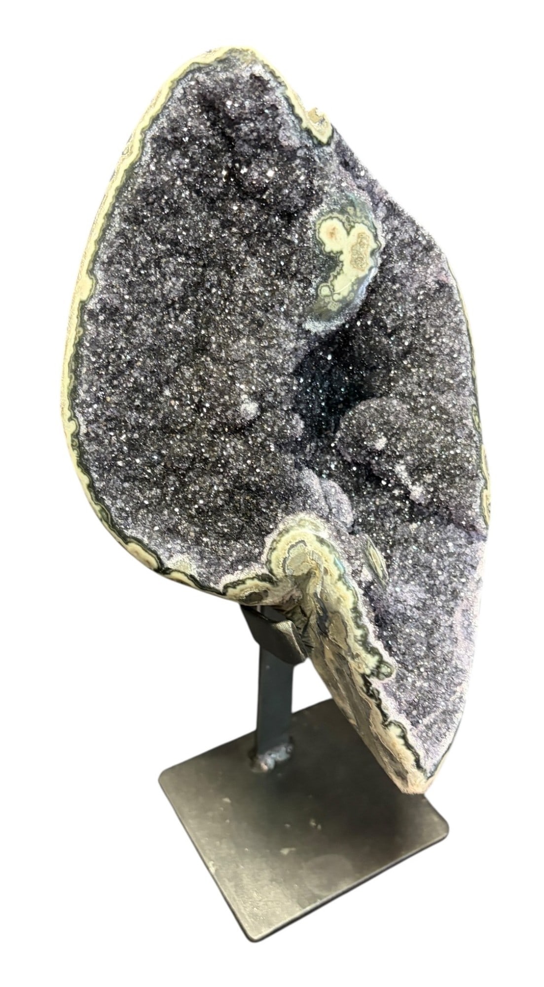 GRAY AMETHYST DRUSY ON IRON STAND: GRAY AMETHYST DRUSY ON IRON STAND. 3.6lbs Height: 9 in. by Width: 6 in. by Depth: 5 IN.