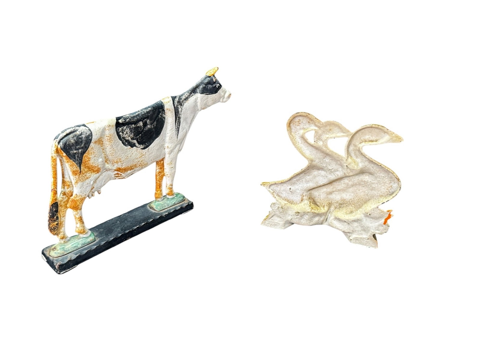 2 IRON DOORSTOPS: 2 IRON DOORSTOPS COW DUCKS Height: 9 in. by Width: 15