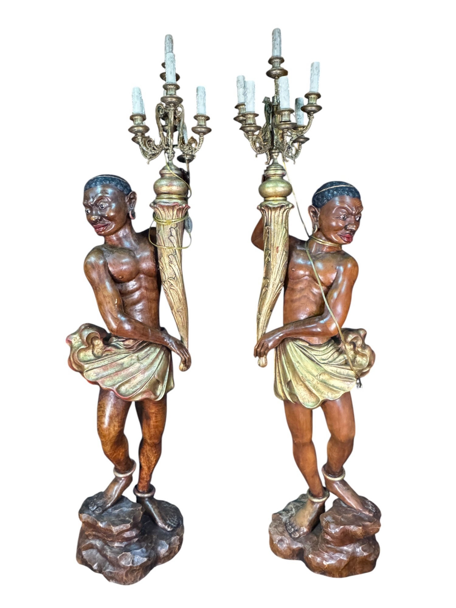 PAIR OF SOUTH ASIAN STYLED WOOD CARVED BLACKAMOORS: PAIR OF SOUTH ASIAN STYLED WOOD CARVED BLACKAMOORS. Height: 50 & 66 in. by Width: 18 in. by Depth: 15 in.