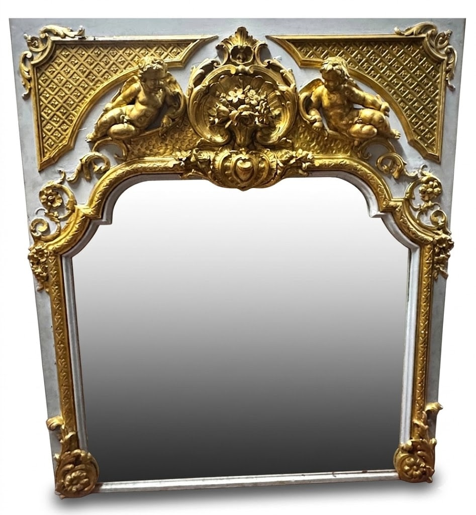 18TH C. GILT AND PAINTED FRENCH TRUMEAU: 18TH C. GILT AND PAINTED FRENCH TRUMEAU, SURMOUNTED WITH PUTTIES LOOKING DOWN AND LOTS OF WOOD CARVING Height: 67 in. by Width: 56 in. by Depth: 5