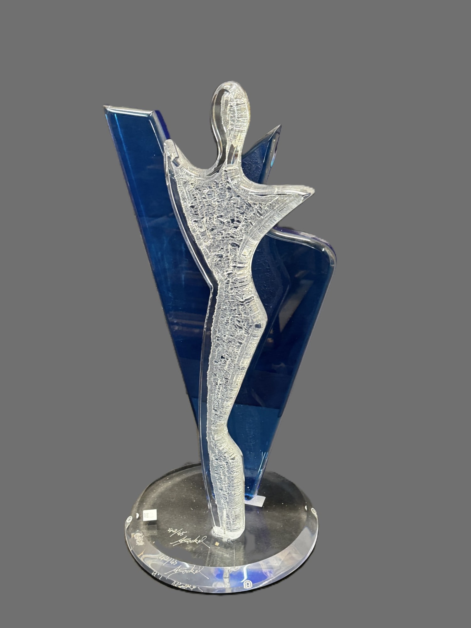 GOCKEL LUCITE STATUE IN BLUE AND CLEAR 42/45: GOCKEL LUCITE STATUE IN BLUE AND CLEAR 42/45 Height: 22 in. by Width: 11