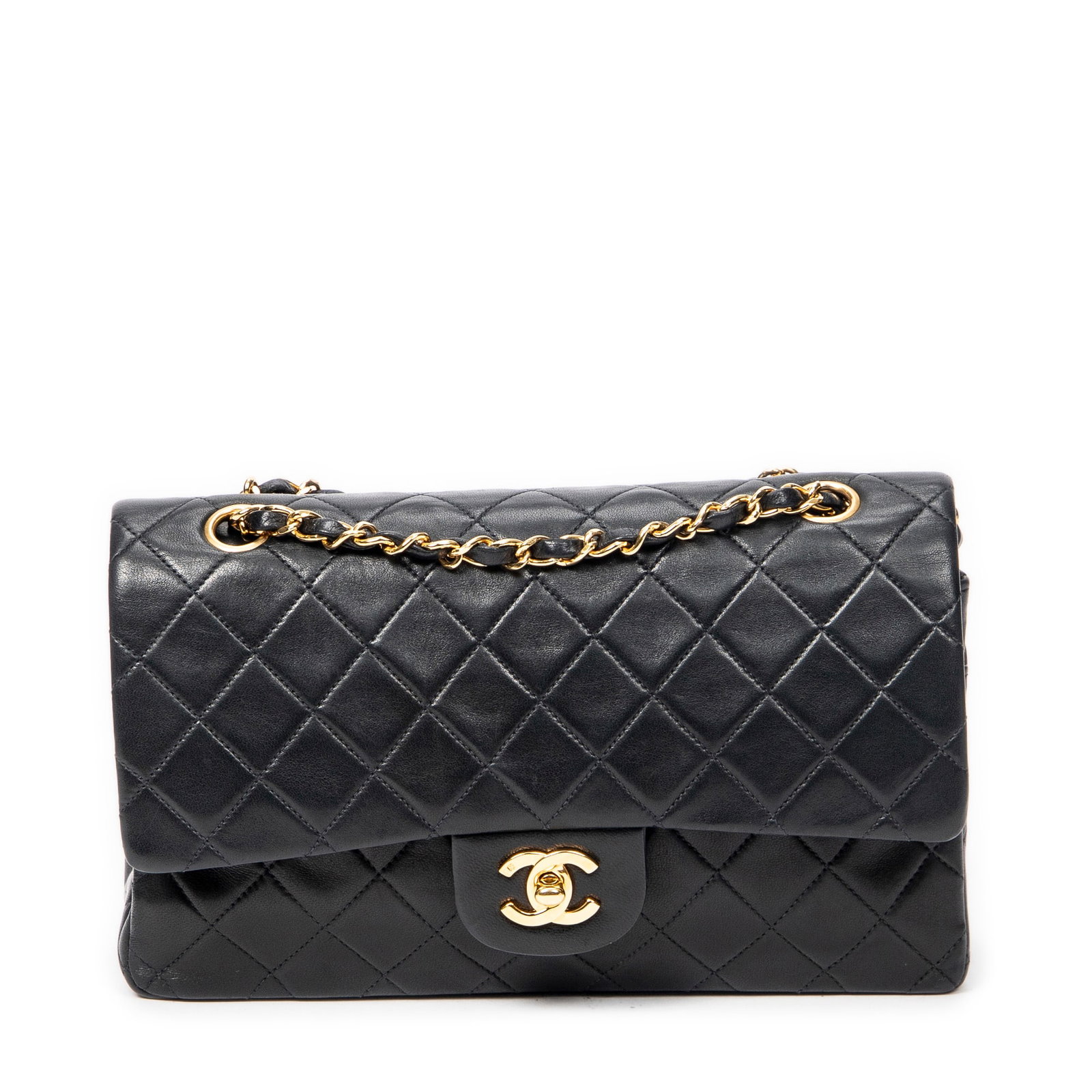 Chanel Classic Double Flap Shoulder Bag: Chanel Classic Double Flap Shoulder Bag. Made from Quilted Lambskin Leather with Interlaced Chain with Black Leather straps/handles and Gold hardware. Dimensions: 25.5*16*7.5cm. Accessories include: S