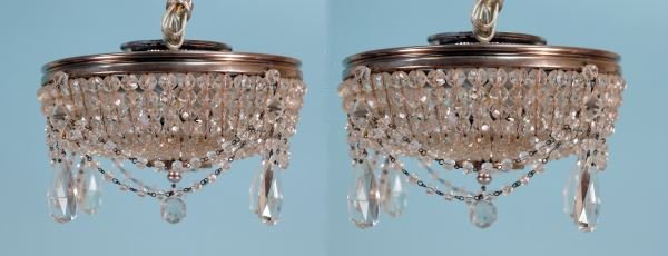 PAIR OF CHROME & CRYSTAL BEAD LIGHT FIXTURES: PAIR OF CHROME & CRYSTAL BEAD LIGHT FIXTURES. CIRCA 1930's. Height: 8 in. by Width: 10 in. by Depth: 10 in.