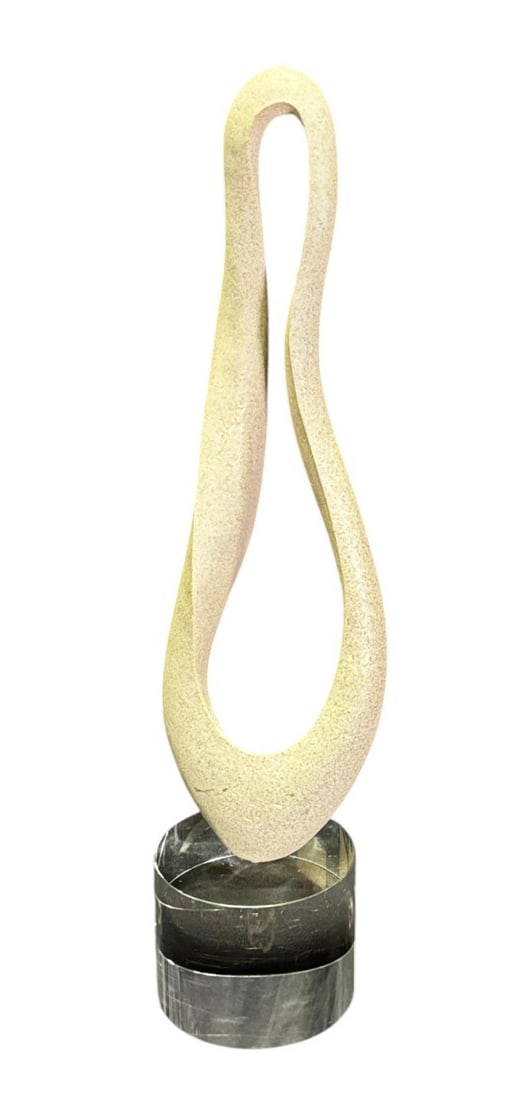MODERN STONE CARVED SCULPTURE: MODERN STONE CARVED SCULPTURE ON A GLASS BASE Height: 26