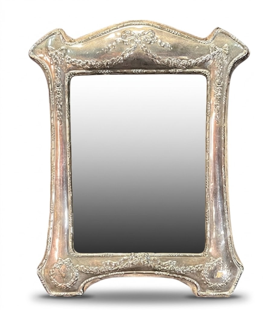STERLING SILVER FRAME: STERLING SILVER PICTURE FRAME. Height: 12 in. by Width: 9.5 in.