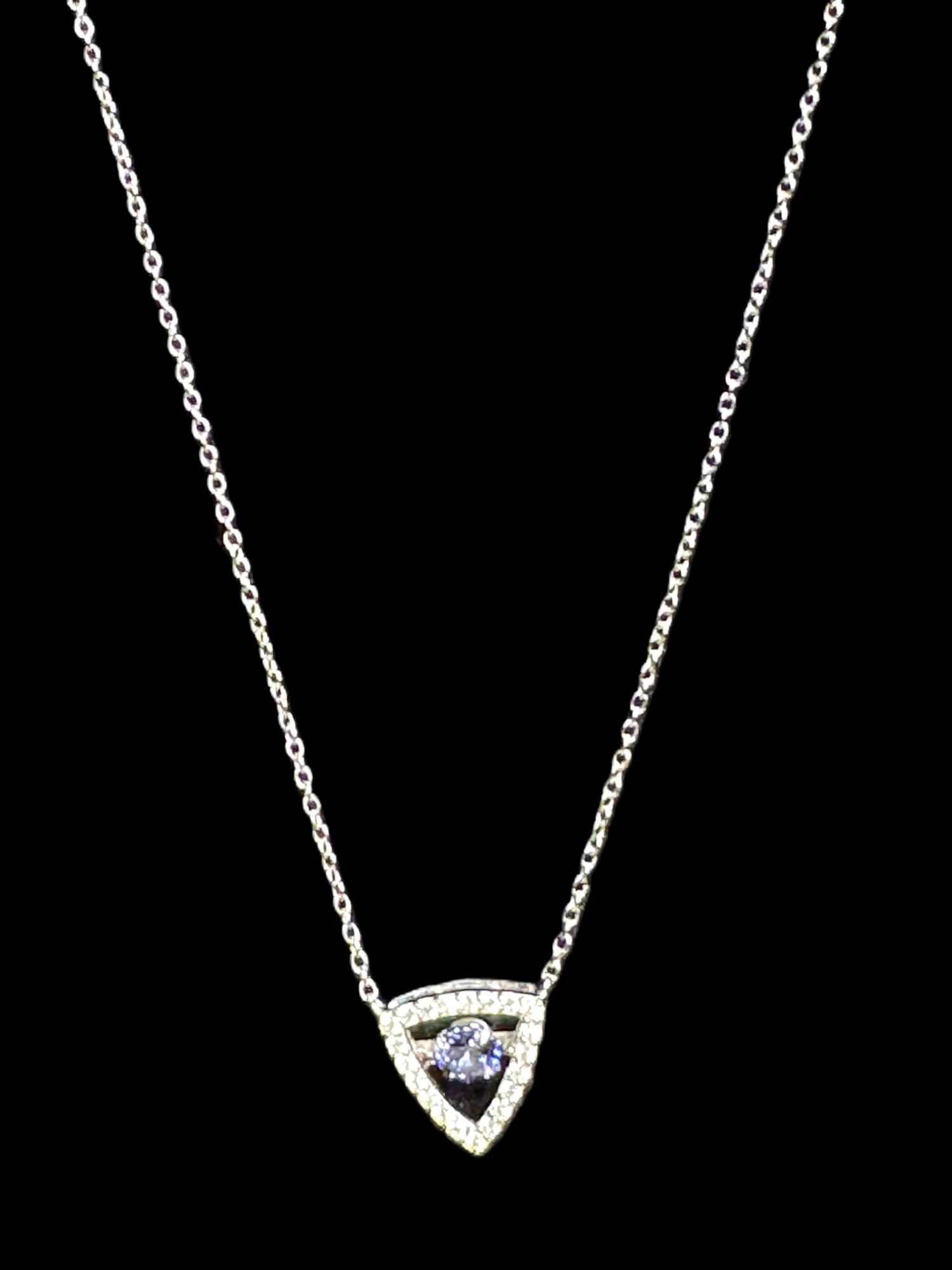 AMETHYST & MICRO PAVE CZ PENDANT/NECKLACE: AMETHYST & MICRO PAVE CZ PENDANT/NECKLACE. ADJUSTABLE LENGTH NECKLACE 16 TO 18 INCHES. Height: 1/2 in. by Width: 3/16 in.