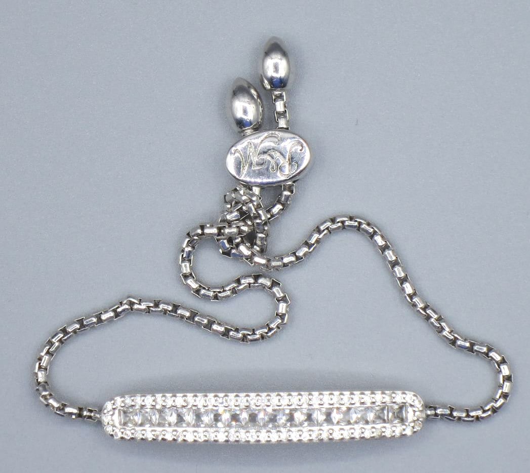 CZ PAVE DIAMOND STERLING BRACELET: CZ PAVE DIAMOND STERLING BRACELET. 8" ADJUSTABLE. Height: 3/16 in. by Width: 1.5 in. by Depth: 1/4 in.
