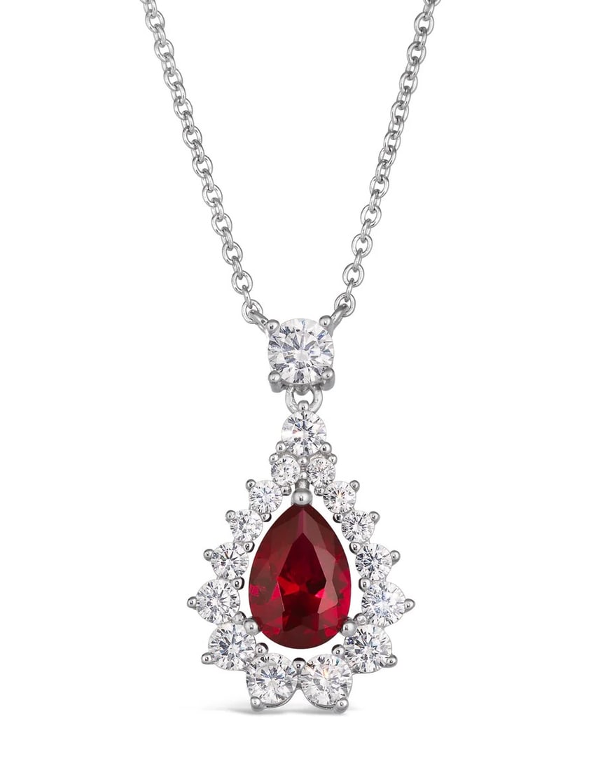 GARNET & SAPPHIRE PENDANT ON STERLING CHAIN: GARNET & SAPPHIRE PENDANT ON STERLING SILVER CHAIN.