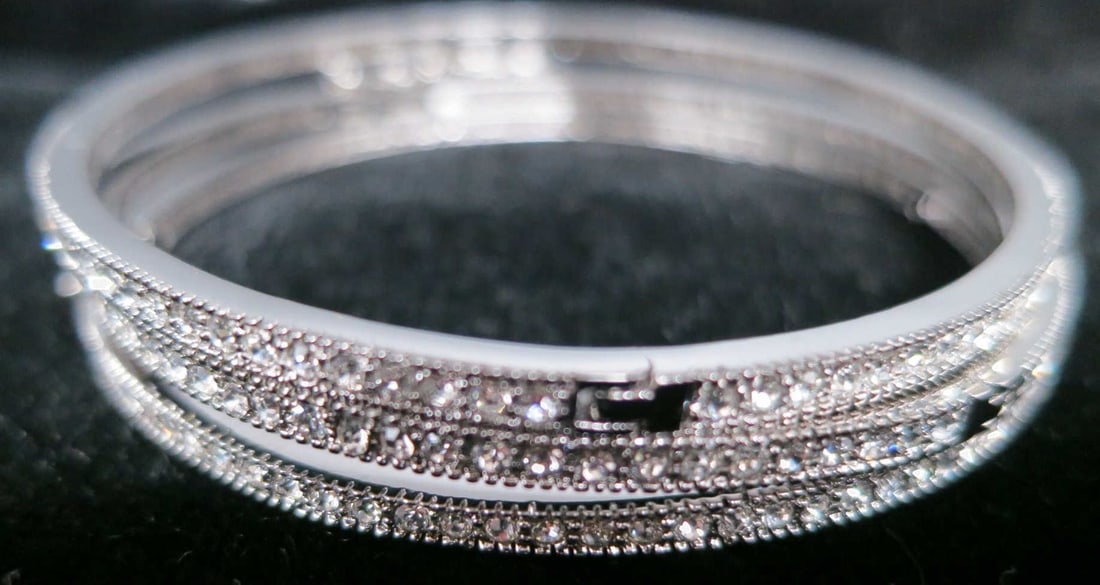 THREE-PIECE SILVER MICRO PAVE BANGLE BRACELET: THREE-PIECE SILVER MICRO PAVE BANGLE BRACELET. Height: 2.5 in. by Width: 2.5 in. by Depth: 1/8 in.
