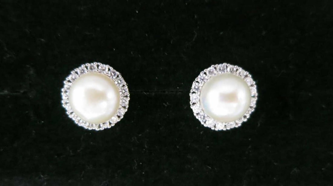 PAIR OF FAUX PEARL & PAVE SAPPHIRE STUD EARRINGS: PAIR OF FAUX PEARL & WHITE PAVE SAPPHIRE STUD EARRINGS. Height: 7/16 in. by Width: 7/16 in. by Depth: 1/4 in.