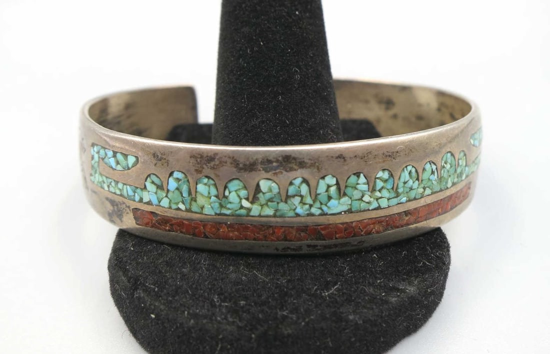 STERLING SILVER CORAL & TURQUOISE CUFF BRACELET: STERLING SILVER CORAL & TURQUOISE CUFF BRACELET. Height: .5 in. by Width: 2 1/4 & 2 1/8 in. by Depth: 2 & 1 7/8 in.