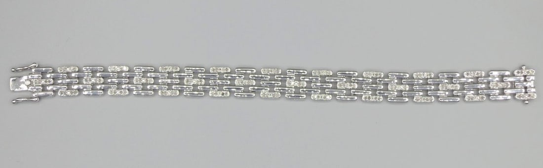 STERLING SILVER 7" LINK BRACELET: STERLING SILVER 7" LINK BRACELET. Height: 1/2 in. by Width: 7 in. by Depth: 1/16 in.