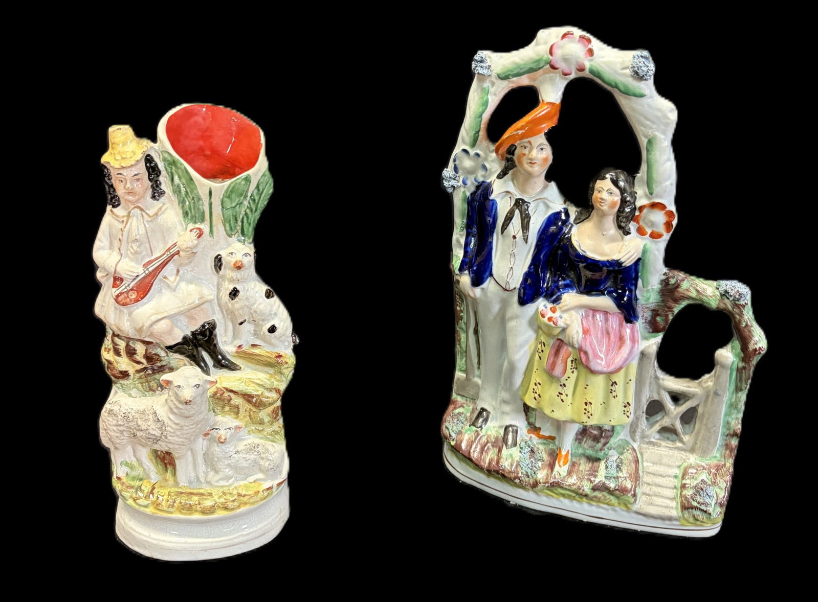 PAIR OF ANTIQUE CERAMIC FIGURINES: PAIR OF ANTIQUE CERAMIC FIGURINES. Height: 2 in. by Width: 6 in. by Depth: 2 in.