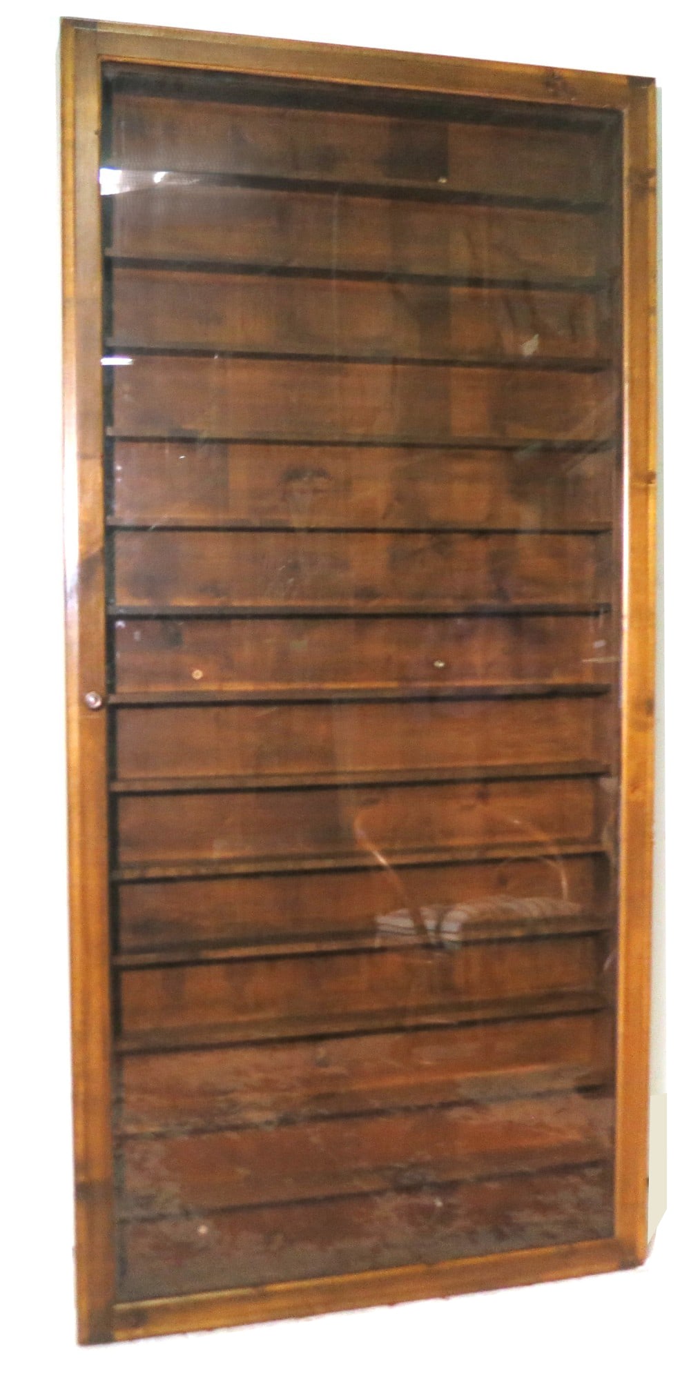BUILT-IN SHELF WITH LOCKED GLASS DOOR ON A PIANO H (1 of 6)