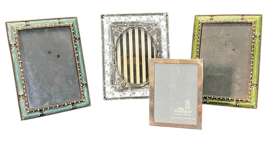 FOUR METAL DECORATIVE FRAMES: FOUR METAL DECORATIVE FRAMES Height: 7 in. by Width: 5 in. by Depth: 5 IN.