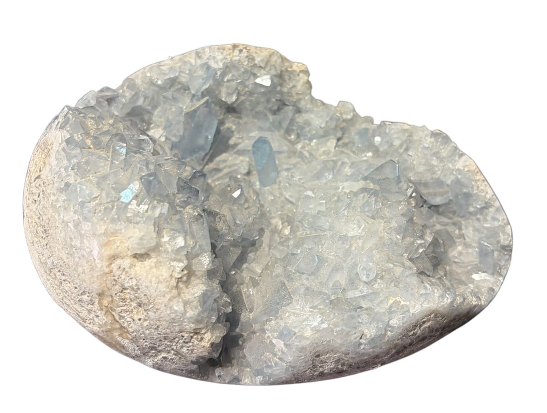 CELESTITE CRYSTAL: CELESTITE CRYSTAL. 4.8lbs. Height: 4 in. by Width: 7 in. by Depth: 5 IN.